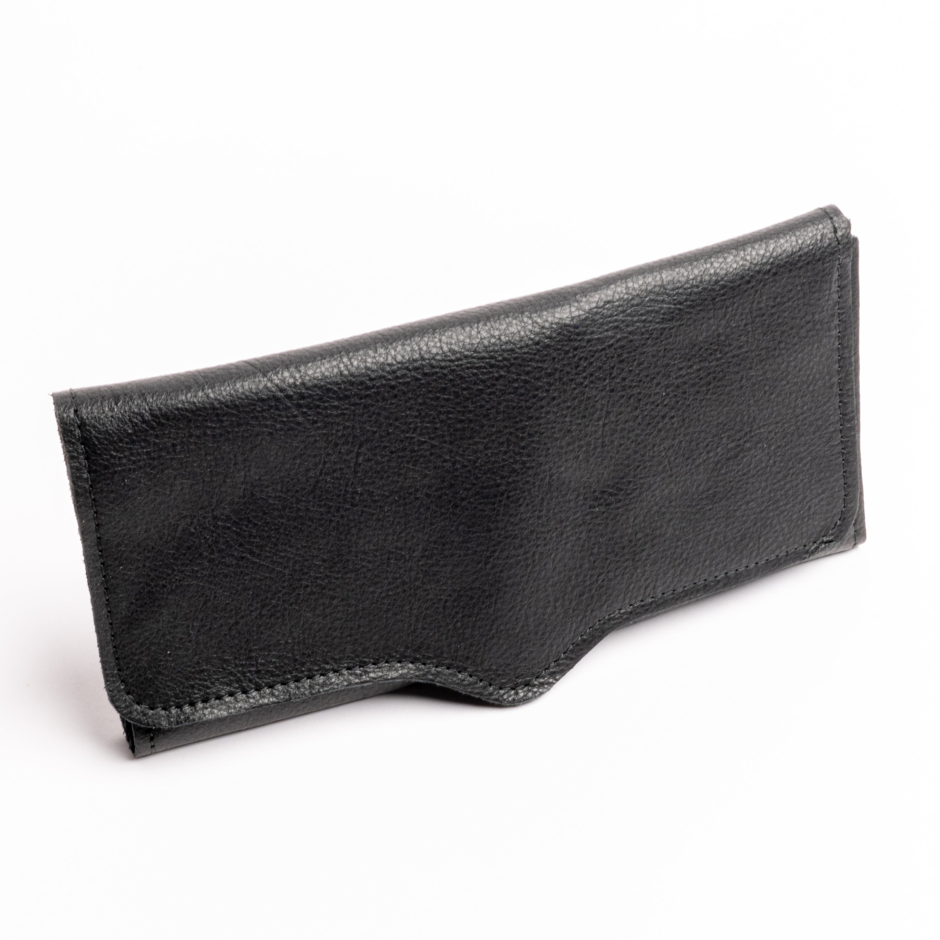 A black textured leather pouch or sleeve with a curved bottom edge and visible stitching, photographed on a clean white background.