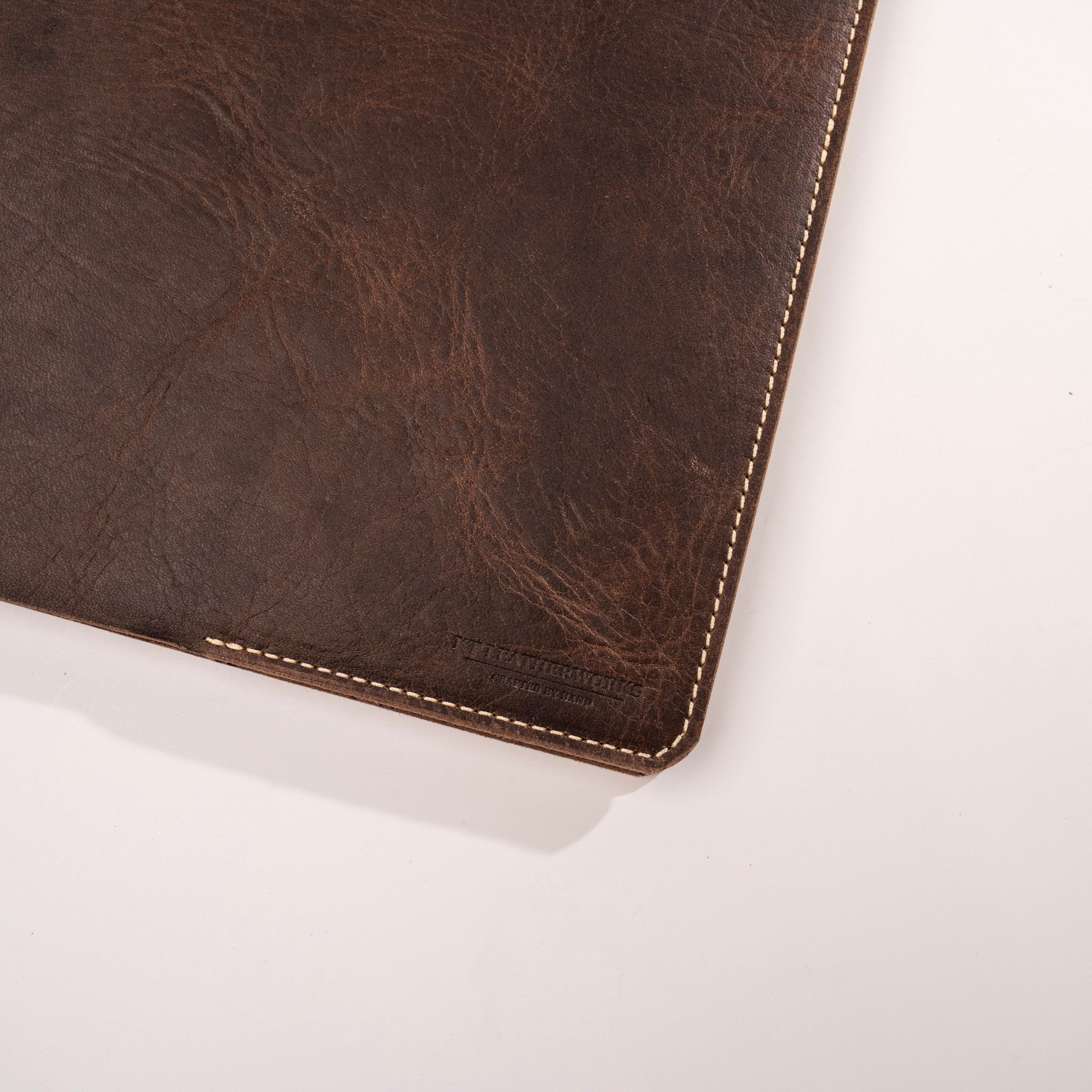 Brown leather product on a white background