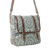 A rectangular crossbody bag with a gray and white mandala patterned canvas body, brown leather straps, and a matching gray shoulder strap, shown on a plain white background.