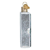 Decorative ornament shaped like a Lite-Brite with a Christmas tree design on a white background