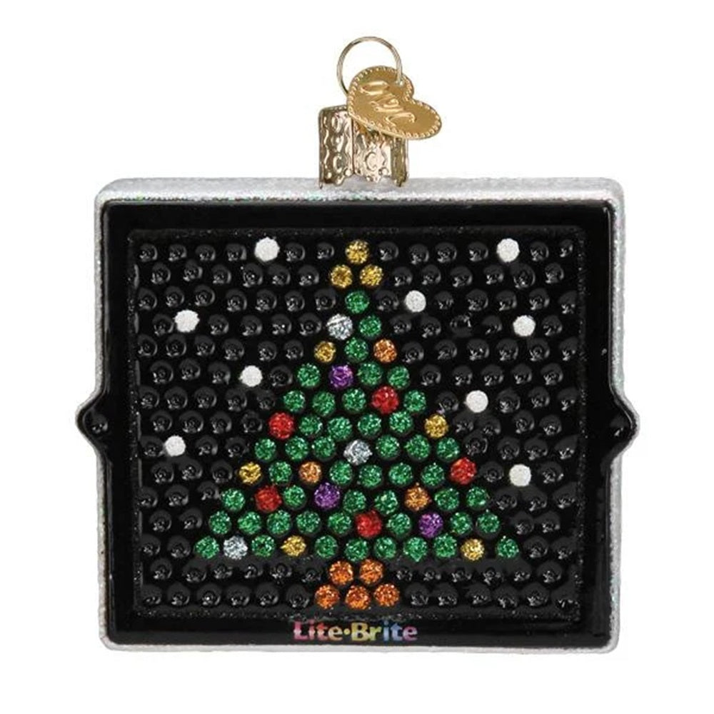 Decorative ornament shaped like a Lite-Brite with a Christmas tree design on a white background