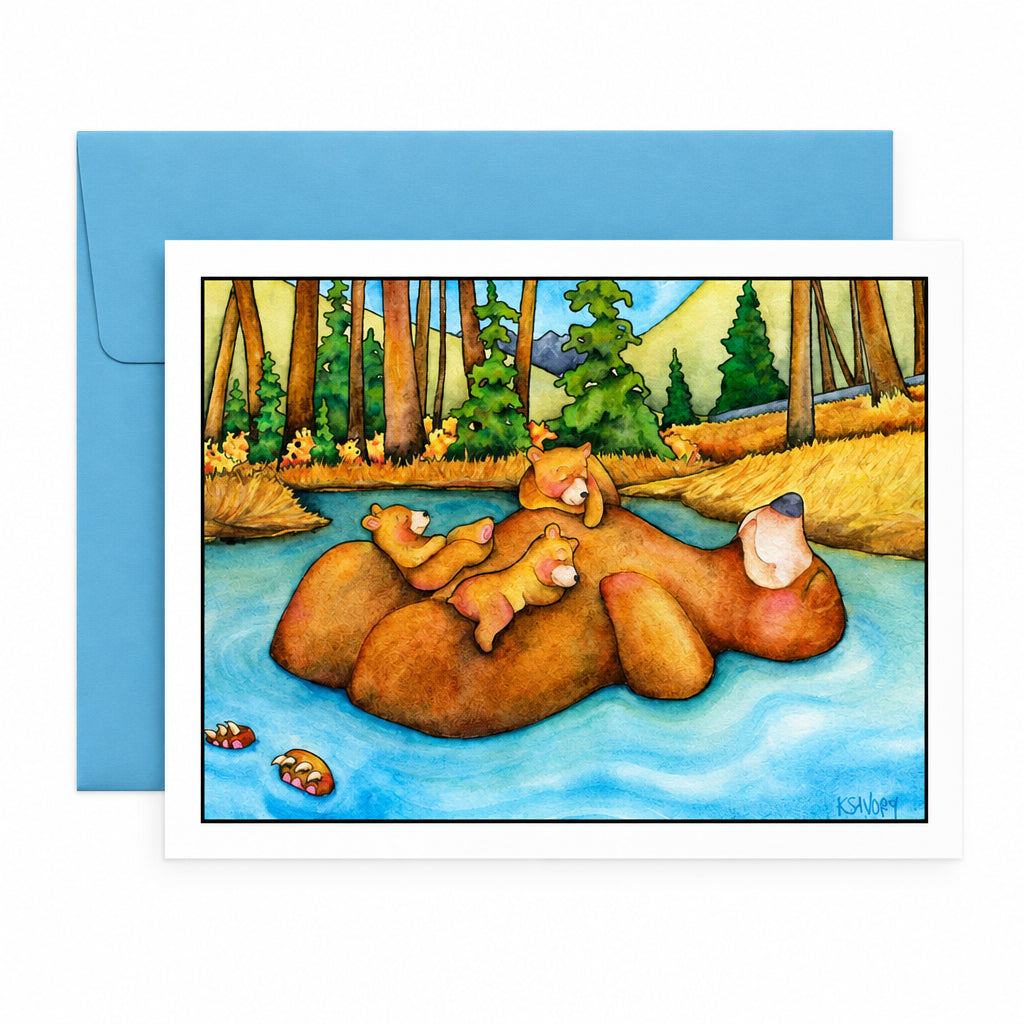 A greeting card with a colorful illustration of a mother bear and her cub(s) in a river, shown with a blue envelope on a white background.