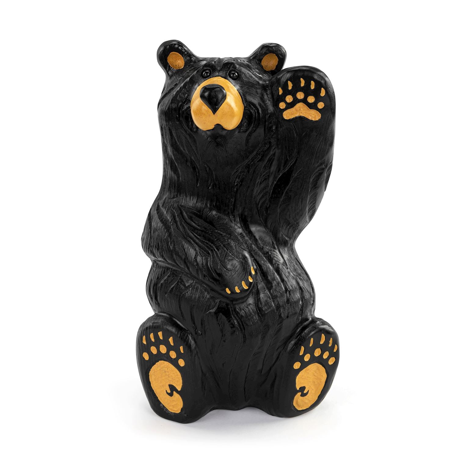 Black bear figurine with yellow accents on a white background