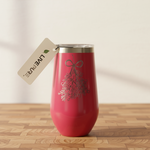 Red insulated tumbler with a silver lid on a wooden surface, featuring a 'Live' tag.