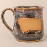 Montana Emblem Mug - dark glaze front