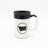 White mug with black interior and handle, featuring a black outline of a state with a heart