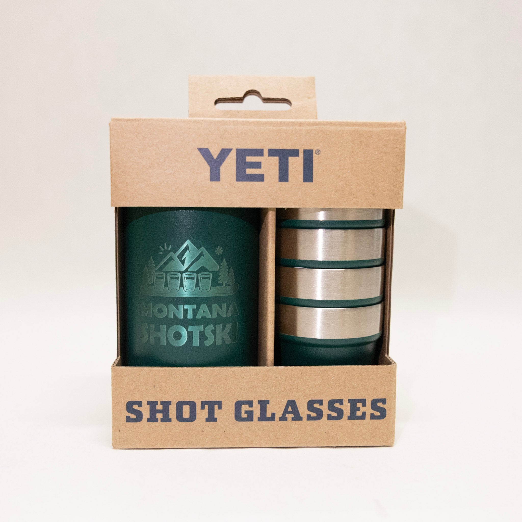 YETI shot glasses in a cardboard packaging with 'YETI' branding.