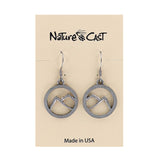 Silver mountain-shaped earrings on a 'Nature Cast' branded card with 'Made in USA' text.