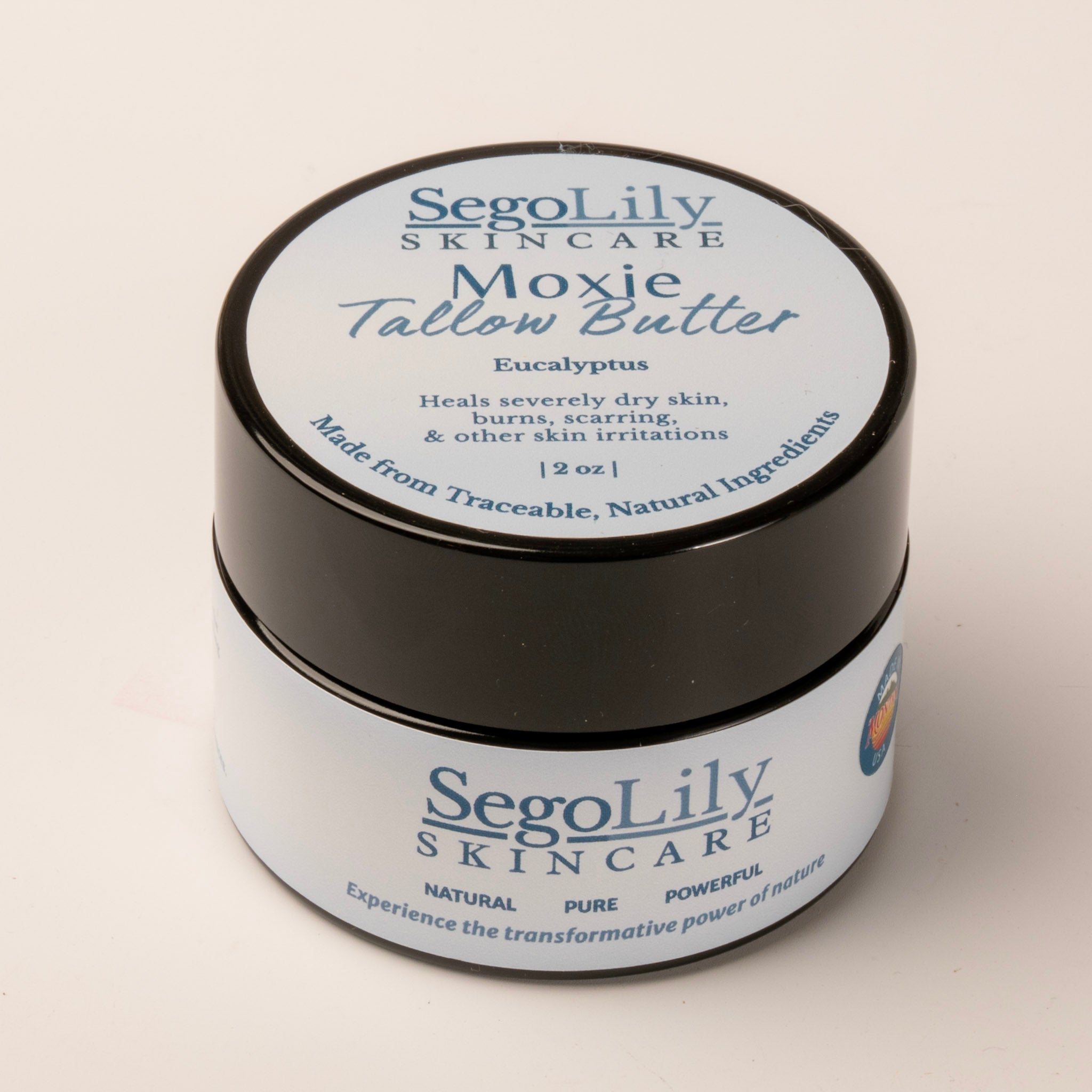 Jar of SegoLily Skincare Moxie Tallow Butter on a light background