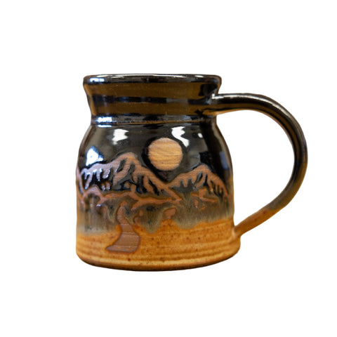 Having homemade kitchen and dishware really elevates your kitchen, that's why we love the Black No Spill Mug by Fire Hole Pottery