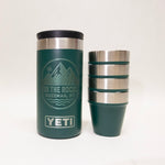Green YETI tumbler with mountain logo and branding on a white background