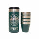 Green YETI tumbler with mountain logo and branding on a white background