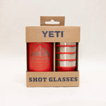 YETI shot glasses in packaging with a red and silver design.
