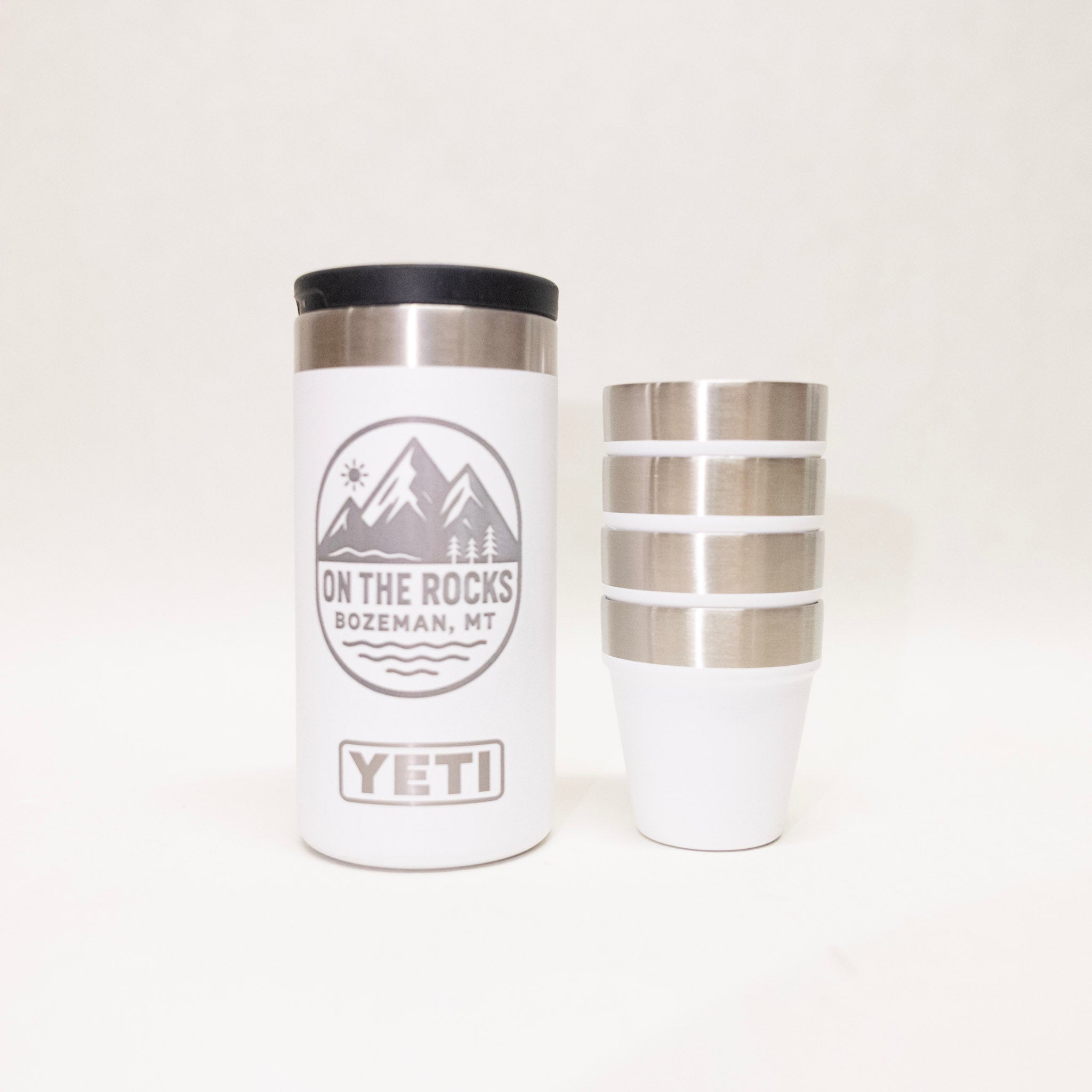 White YETI tumbler with mountain logo on a white background