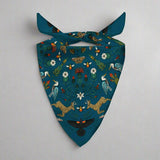 Decorative bandana with nature-themed design on a white background