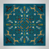 Decorative blanket with nature-themed pattern featuring animals and plants on a blue background