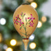 Gold is a beautiful color to add to the family Christmas tree. Whether you color coordinate your Holiday decor or not, this gold Parvaneh Flowers and Dragonflies Ornament by Inner Beauty is a stunning addition to any tree