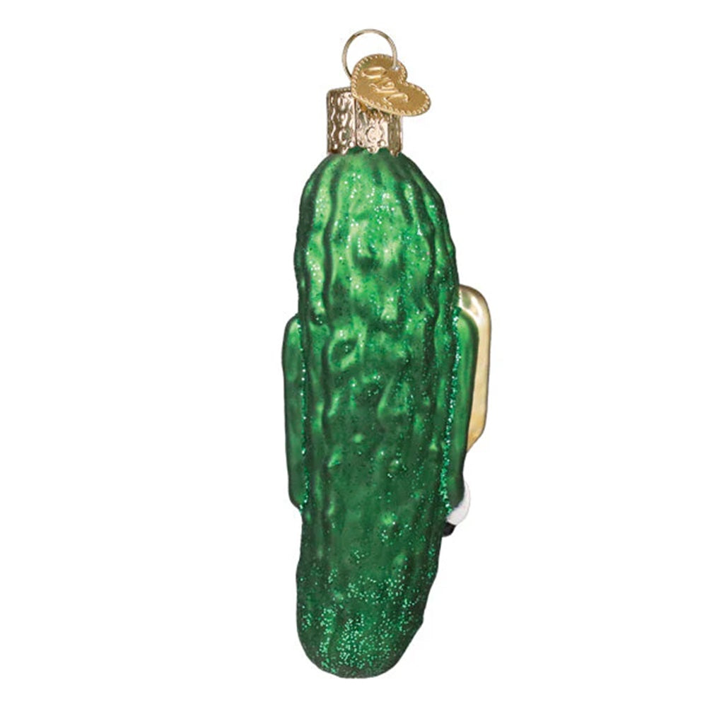 Green glass pickle ornament on a white background