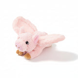 Pink plush pig toy on a white background