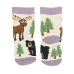 Pair of socks with moose, bear, and tree pattern on a white background