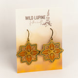 Floral earrings on a Wild Lupine Folkcraft branded card