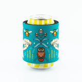 Can with a decorative blue sleeve featuring illustrations of animals and plants on a white background.