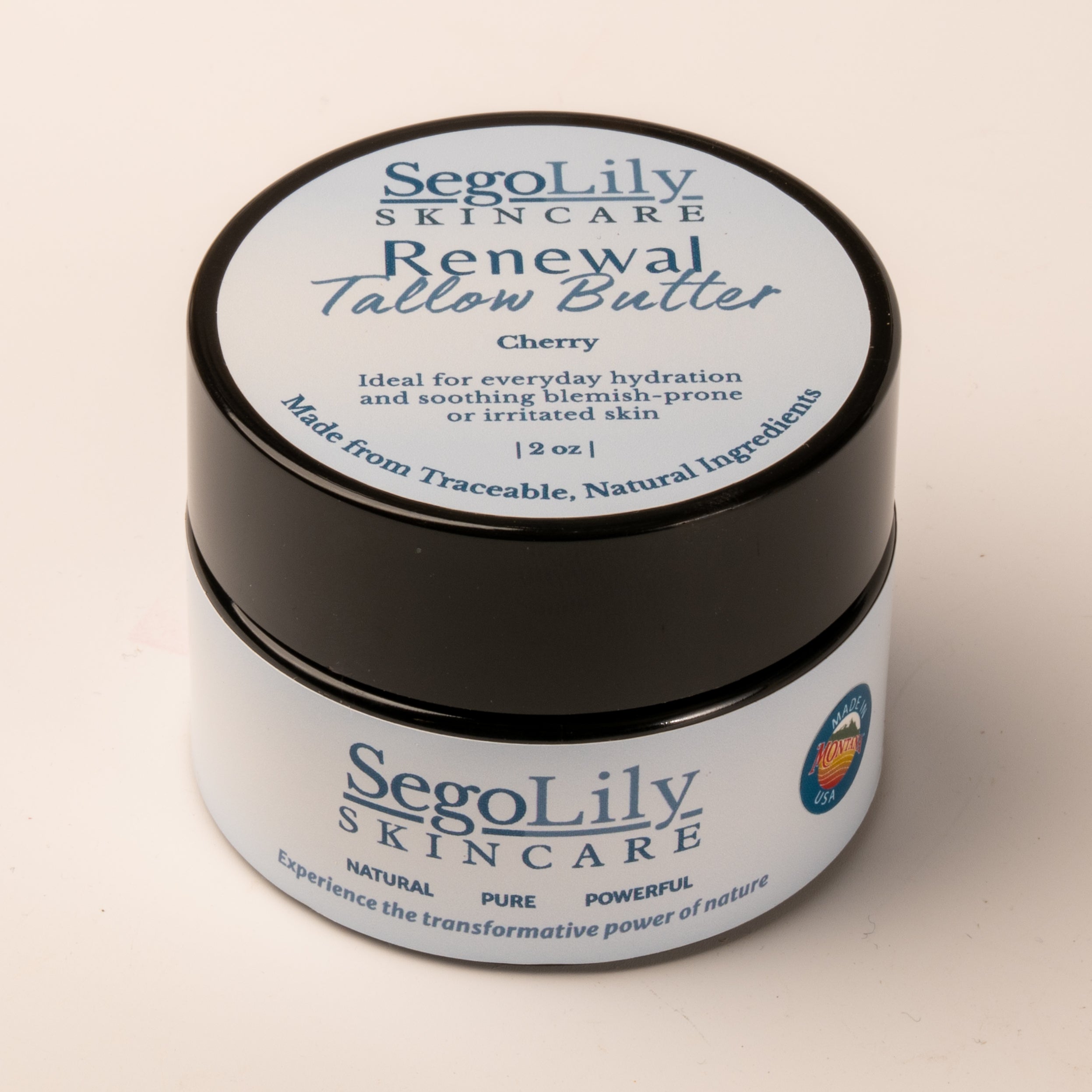Jar of SegoLily Skincare Renewal Tallow Butter on a beige background