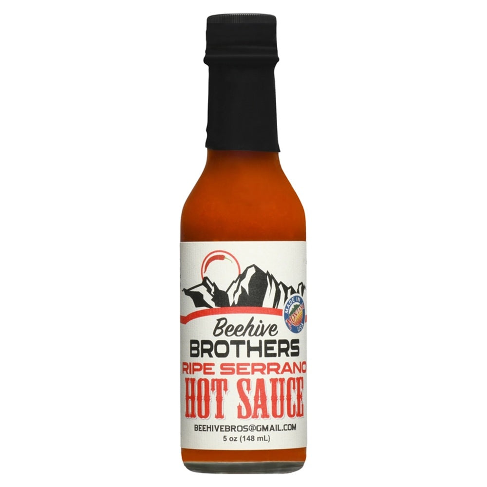 Bottle of Beehive Brothers Ripe Serrano hot sauce on a white background