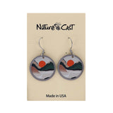 Earrings with sunset design on a 'Nature Cast' branded card.
