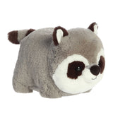Plush toy raccoon on a white background