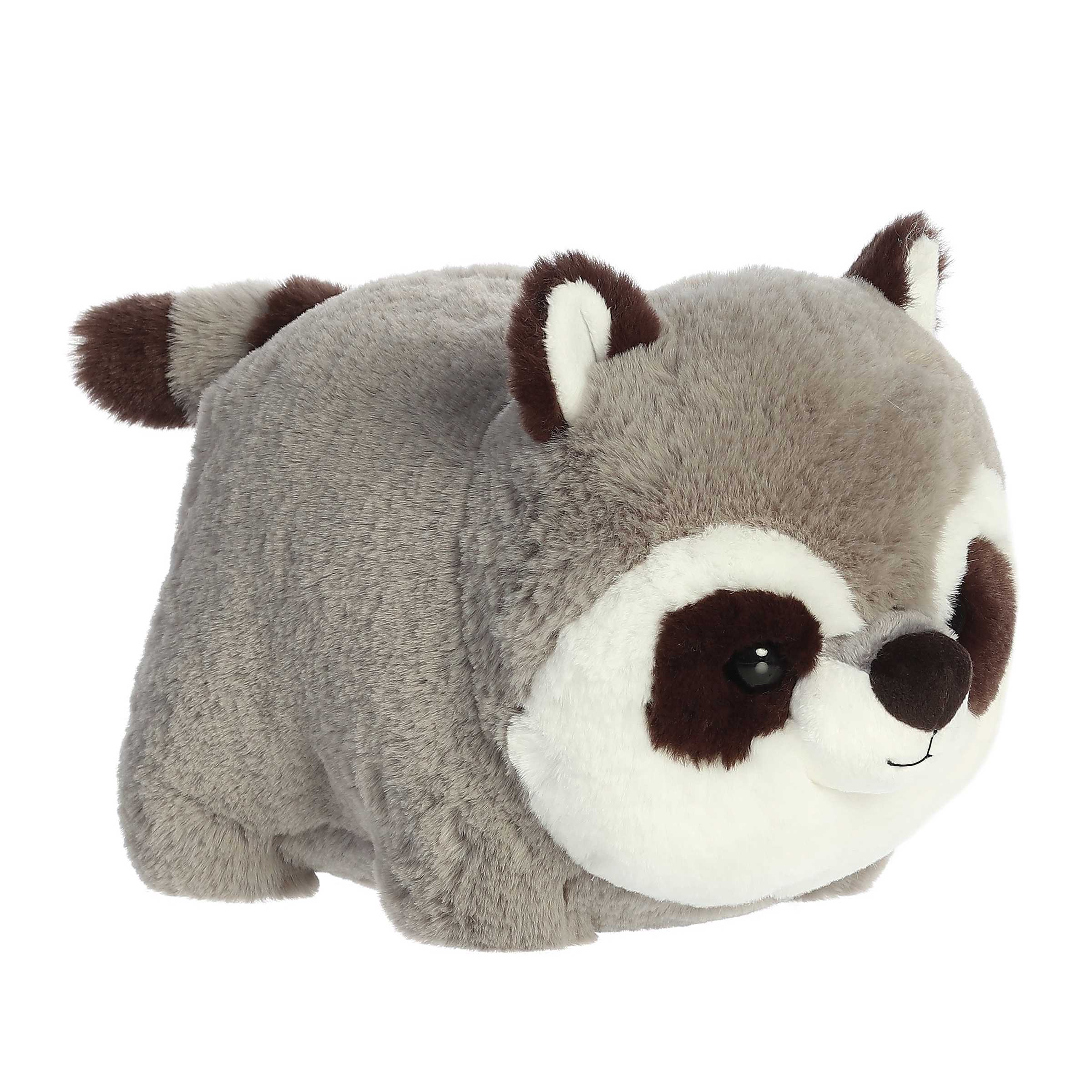 Plush toy raccoon on a white background