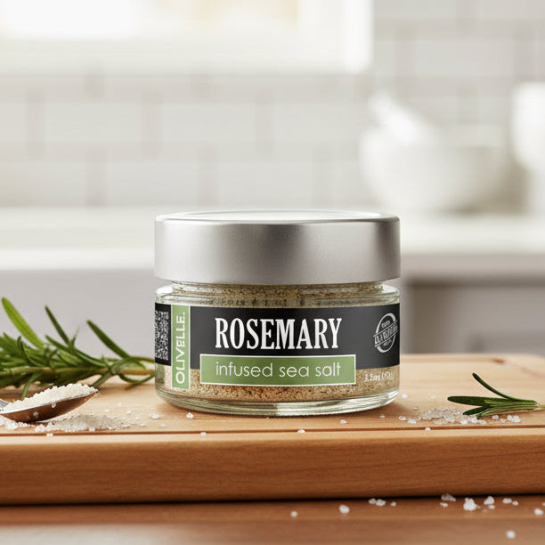 Jar of rosemary infused sea salt with a visible brand label on a white background