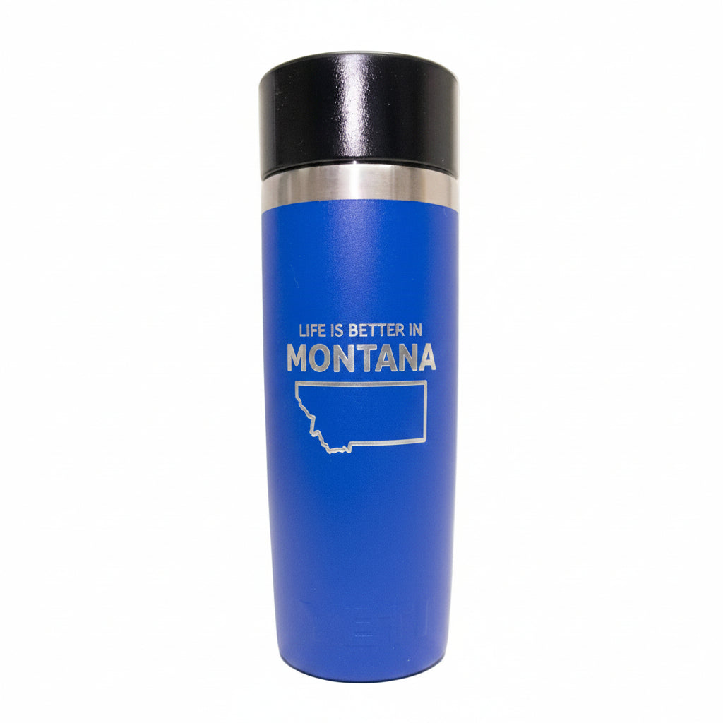 Blue tumbler with 'Better in Montana' text on a white background
