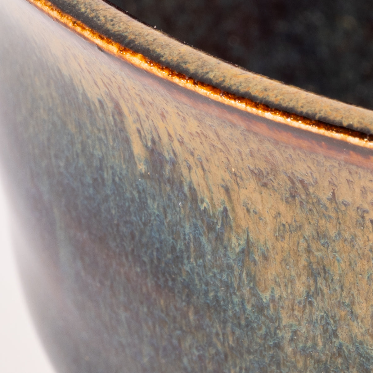 Close-up of a ceramic pot with a textured surface