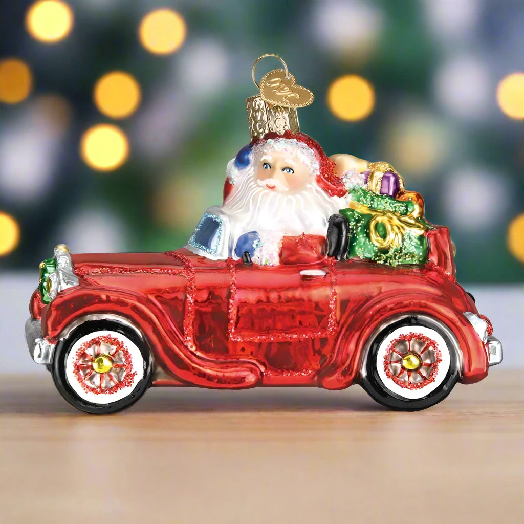 antique santa in car glass ornament