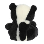 Plush toy skunk on a white background