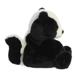 Plush skunk toy on a white background