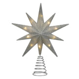 Decorative star-shaped Christmas tree topper with a white background