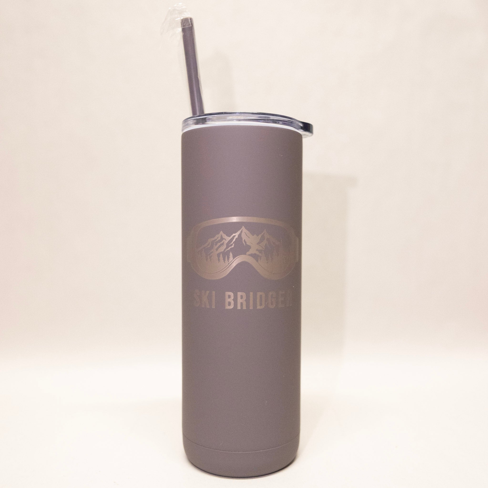 Gray tumbler with mountain logo and 'Ski Bridger' text on a white background