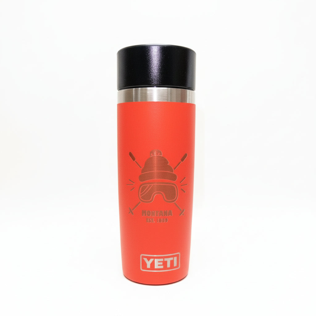 Red YETI mug with black lid on a white background