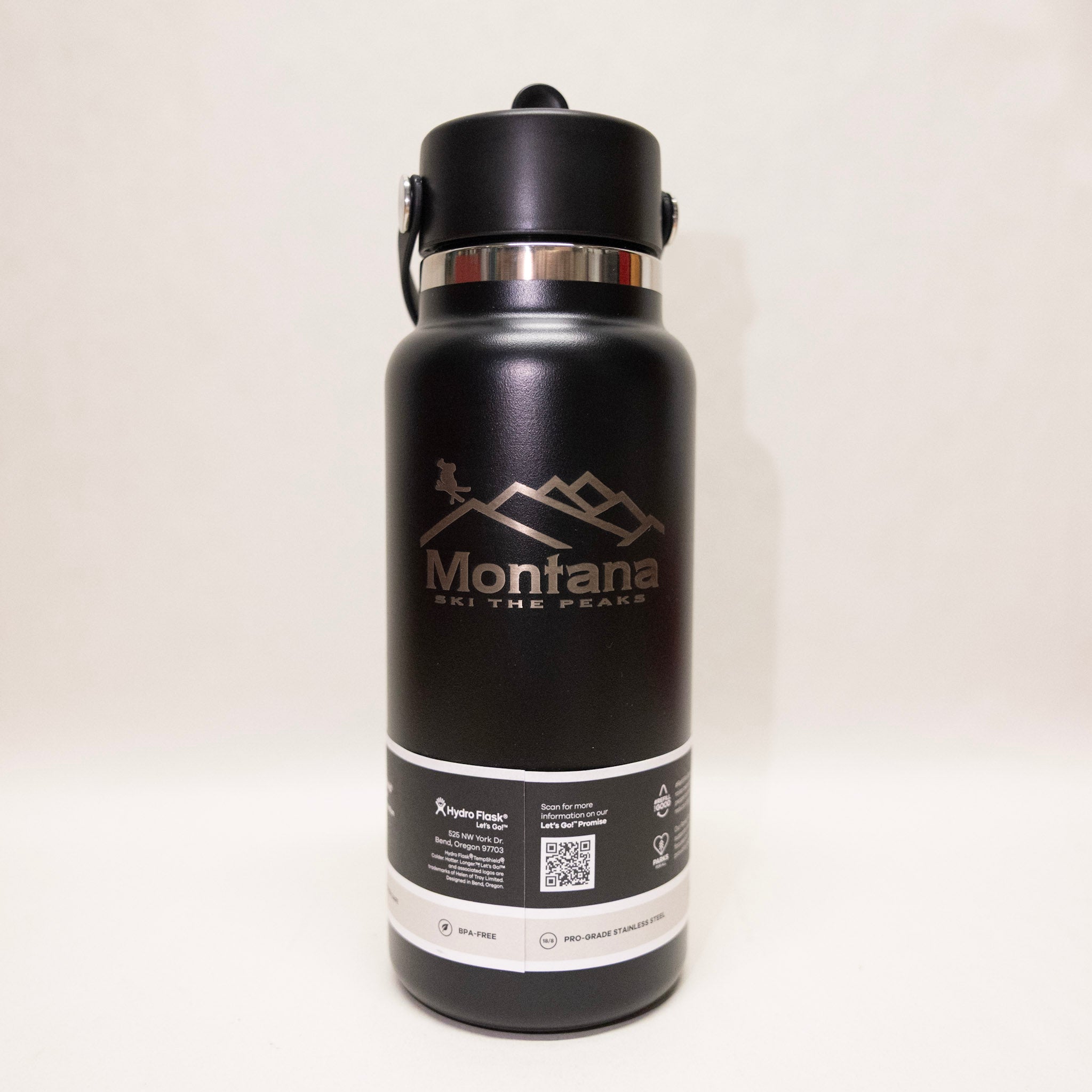 Black water bottle with 'Montana' branding on a white background