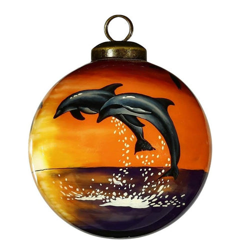 Decorating the Christmas tree doesn't have to always reflect the weather. Instead,  brighten up your tree and remind yourself of warmer days with the Sunset Dolphin Ornament by Inner Beauty. 