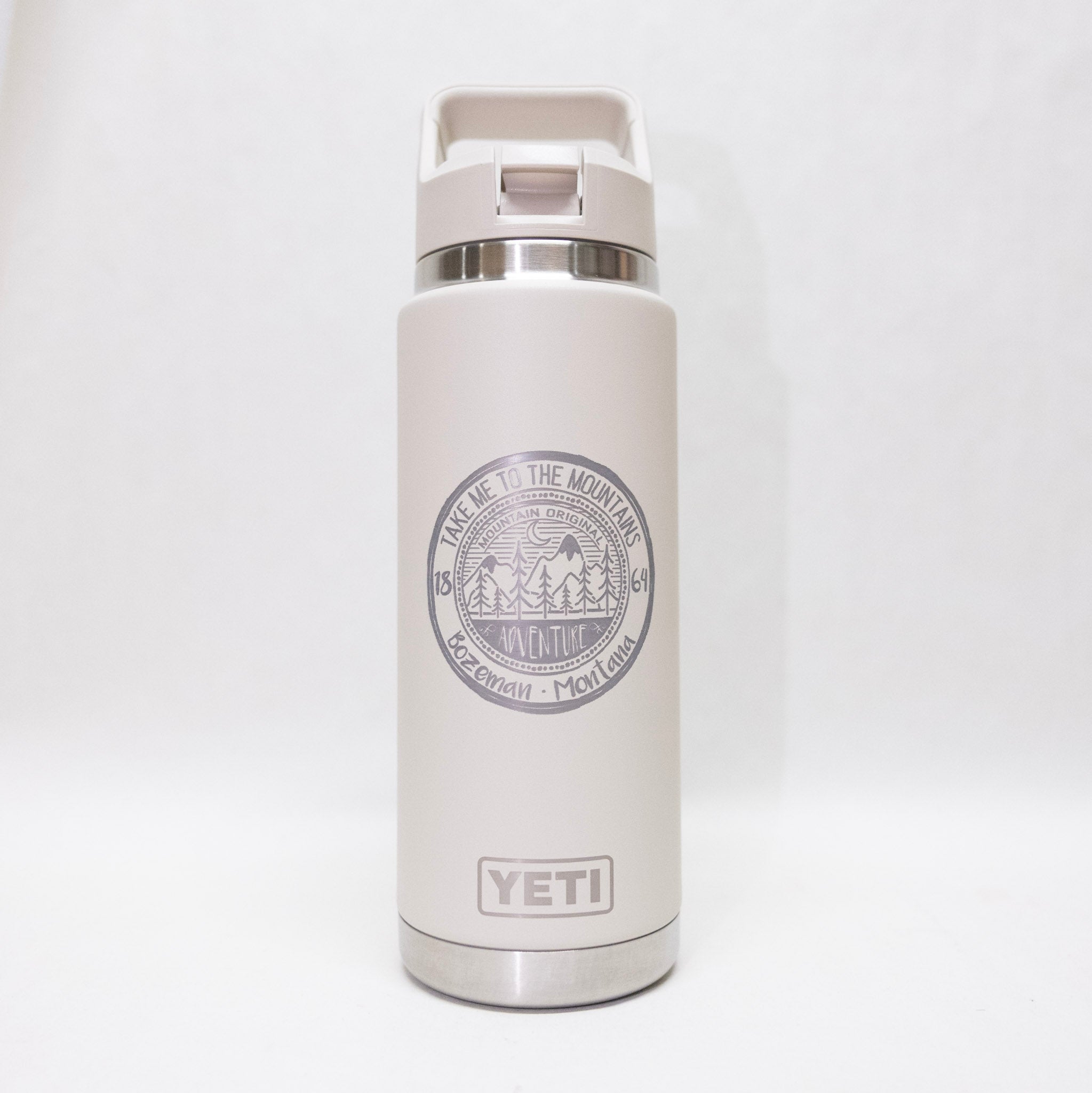 White YETI water bottle with a logo on a white background