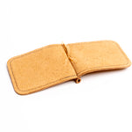 A tan felt pocket money clip with a stitched border and a small gold-tone metal clasp, shown open on a white background.
