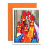 A square art print or greeting card featuring a colorful painted group of chickens, shown in front of an orange envelope on a white background.