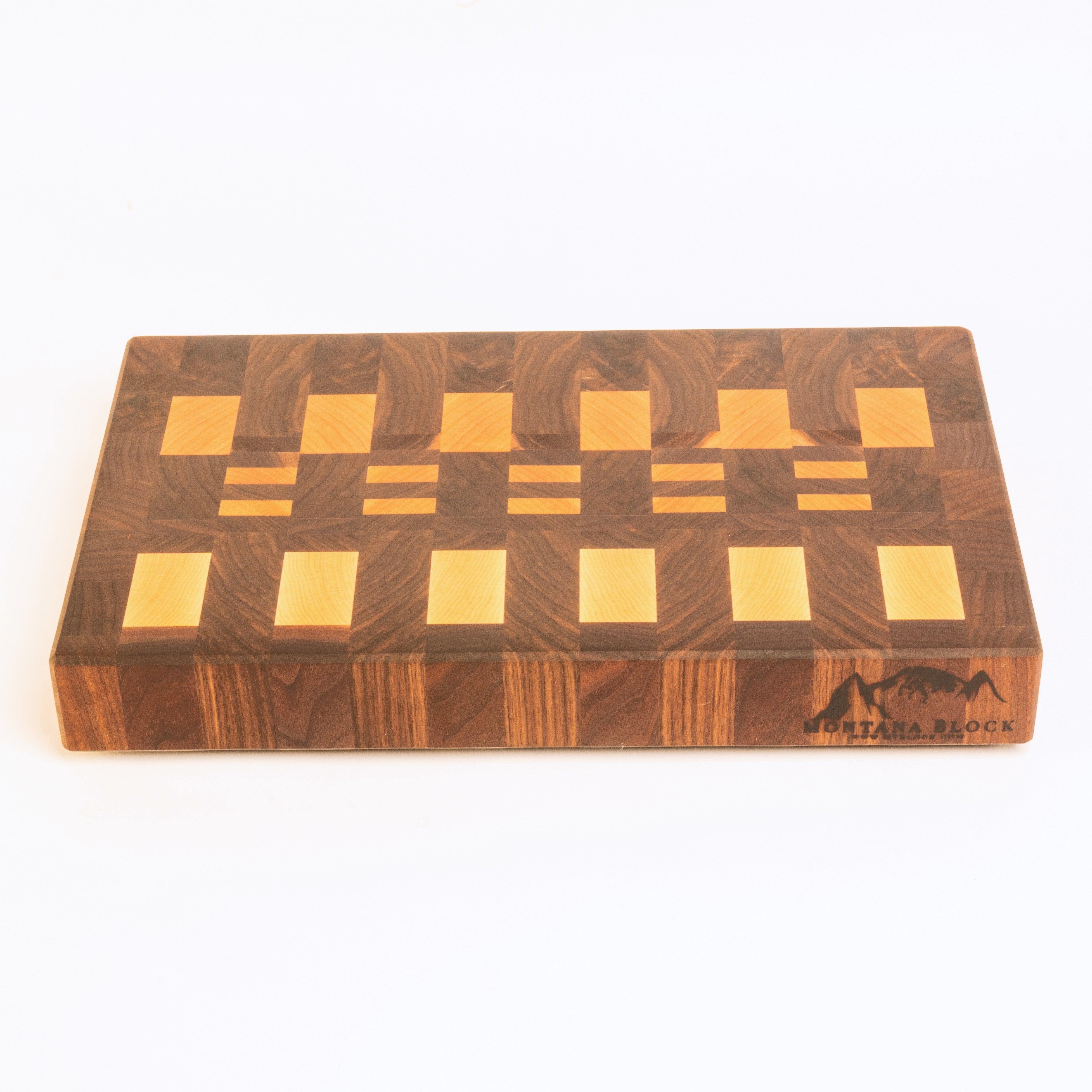 Wooden cutting board with a checkered pattern on a white background