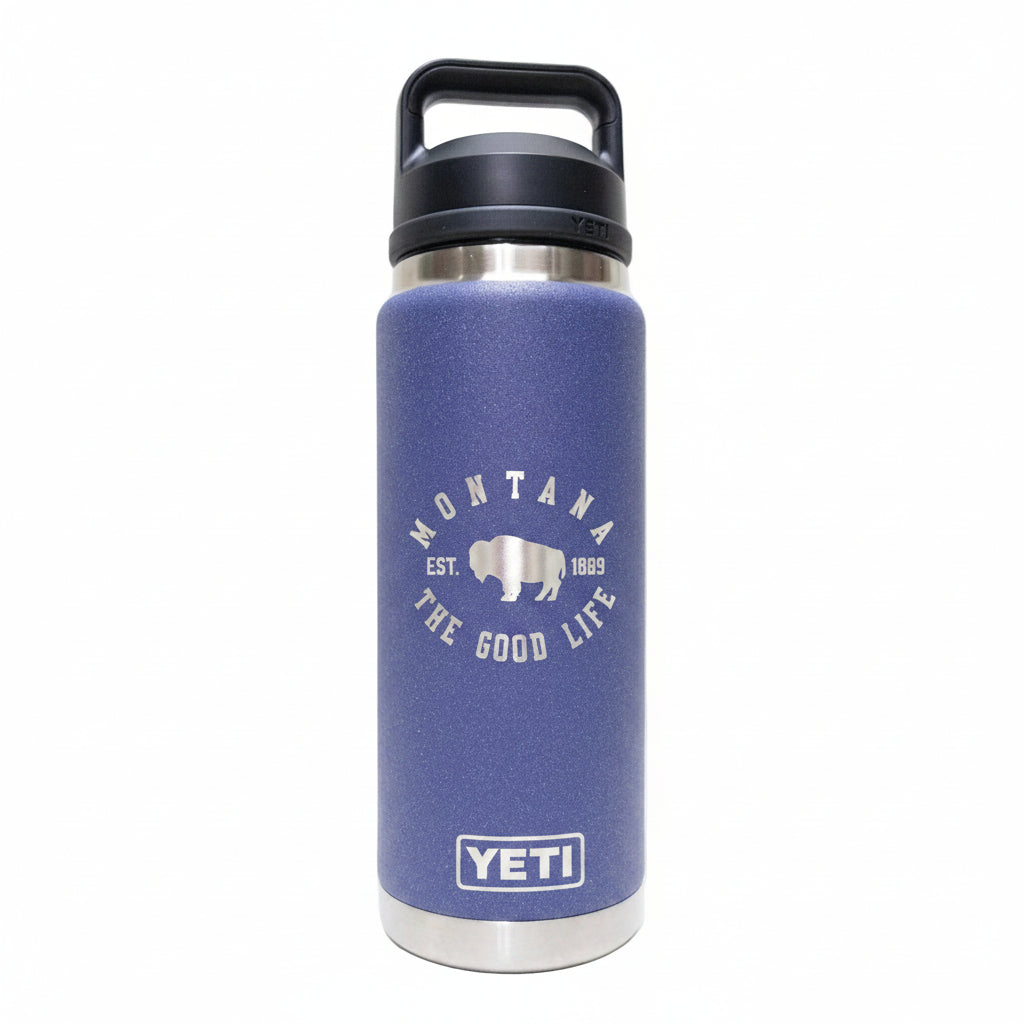 Blue YETI water bottle with black lid on a white background