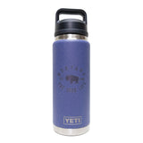 Blue YETI water bottle with black lid on a white background
