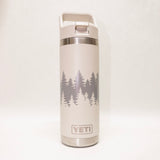 White YETI bottle with tree design on a white background