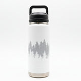 White water bottle with tree pattern on a wooden surface